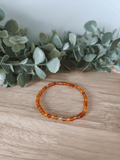 Bracelet Cornaline 4mm, pierres naturelles polies Collection Pierre d’Exception, bijou rouge orangé pour vitalité et confiance en soi.