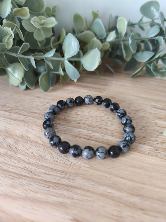 Bracelet Obsidienne Flocon de Neige 8mm, pierres naturelles noires tachetées, Collection Pierre d’Exception, bijou protecteur élégant.