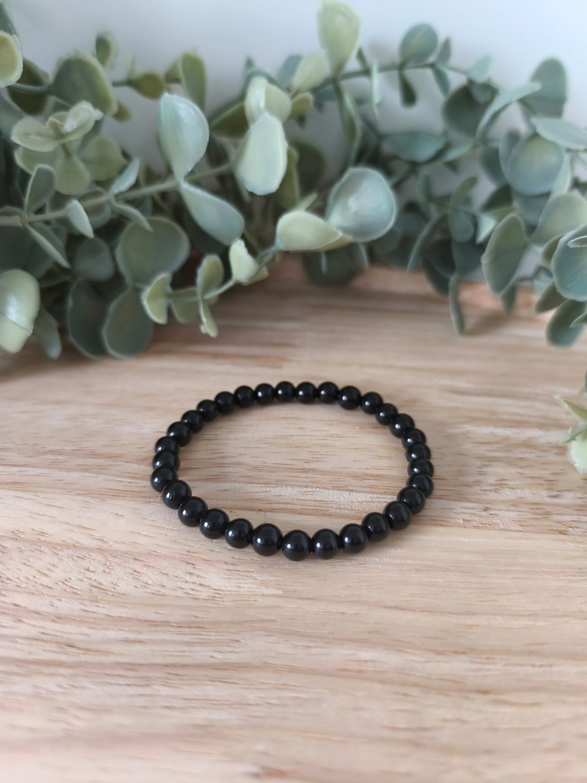 Bracelet Obsidienne Noire 6mm, pierres naturelles polies, Collection Pierre d’Exception, bijou noir protecteur et élégant.