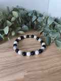 Bracelet en Onyx et Howlite blanche en acier inoxydable – Protection & apaisement – Collection Éclat d’Acier